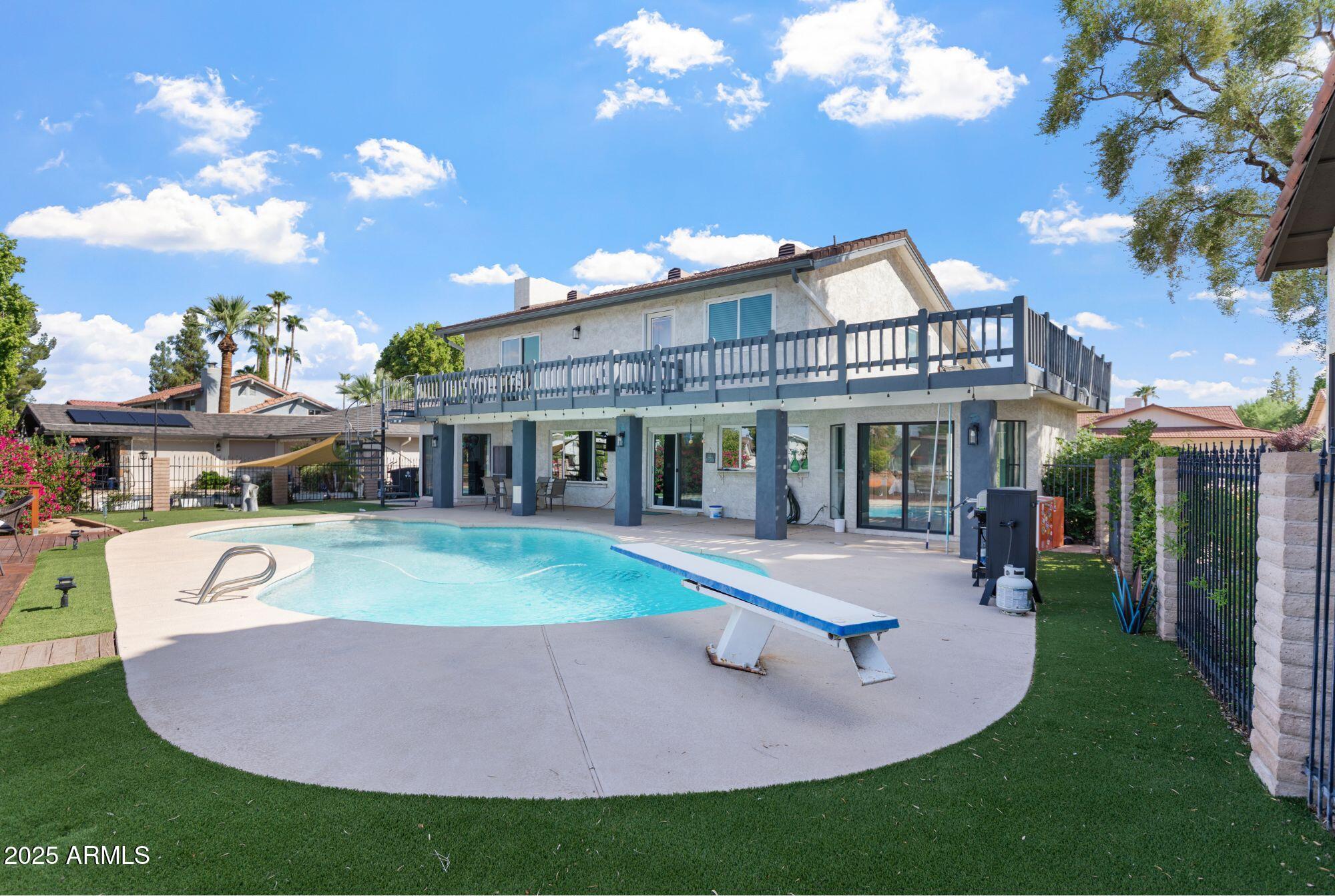 1210 East Harbor View Drive Tempe, AZ 85283 - Photo 48 of 68 a view of a house with a yard porch and sitting area