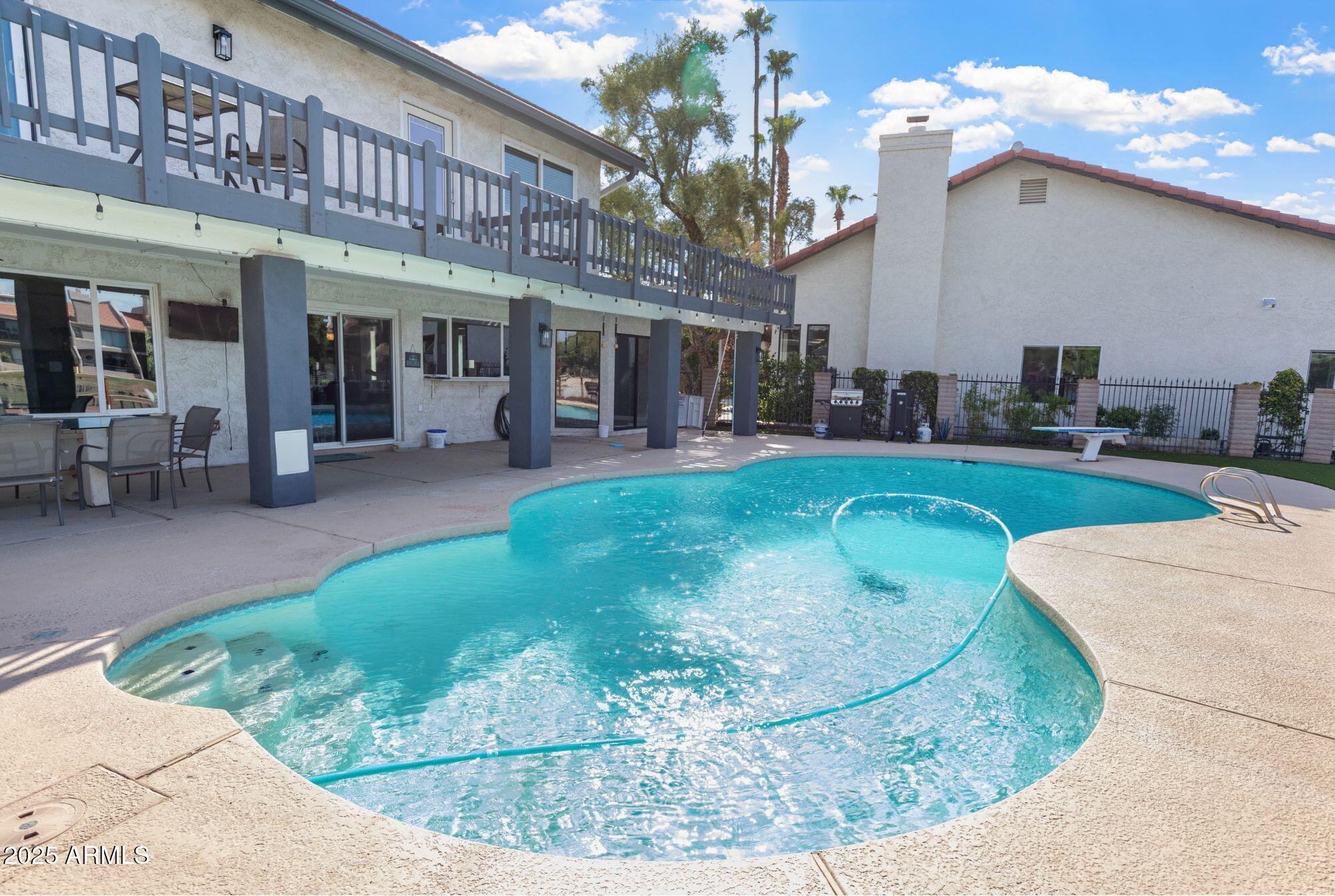 1210 East Harbor View Drive Tempe, AZ 85283 - Photo 52 of 68 a view of a house with a patio