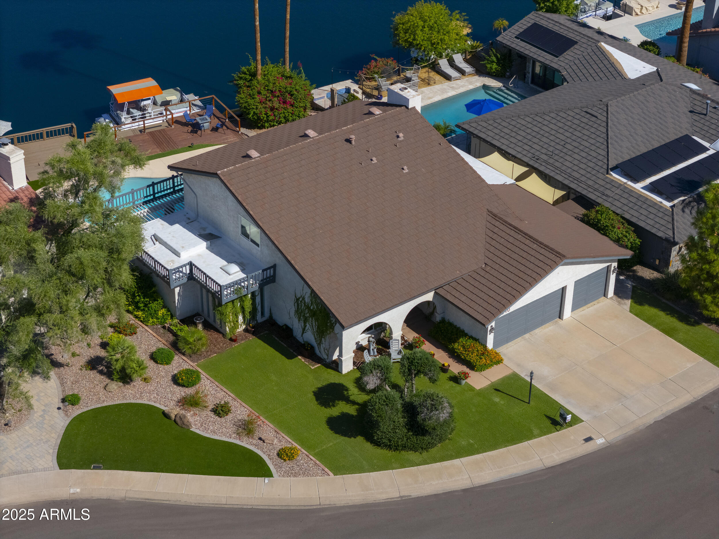 1210 East Harbor View Drive Tempe, AZ 85283 - Photo 57 of 68 a picture of a building with a yard