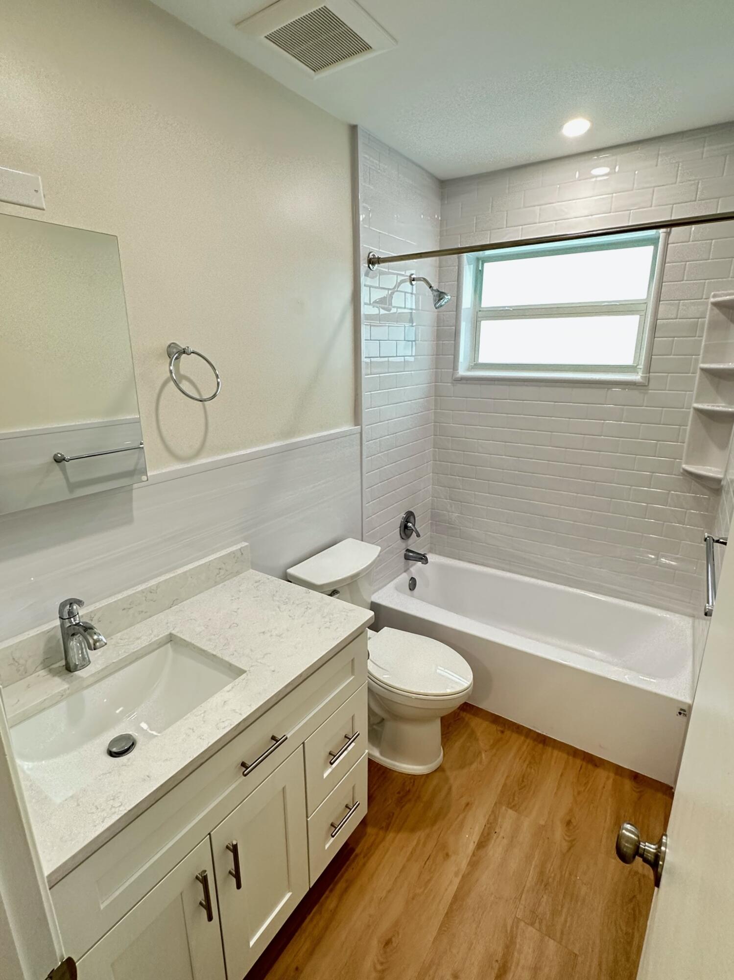 2018 Spanish Trail, Unit 2 Delray Beach, FL 33483 - Photo 12 of 13 a bathroom with a sink a toilet and bathtub