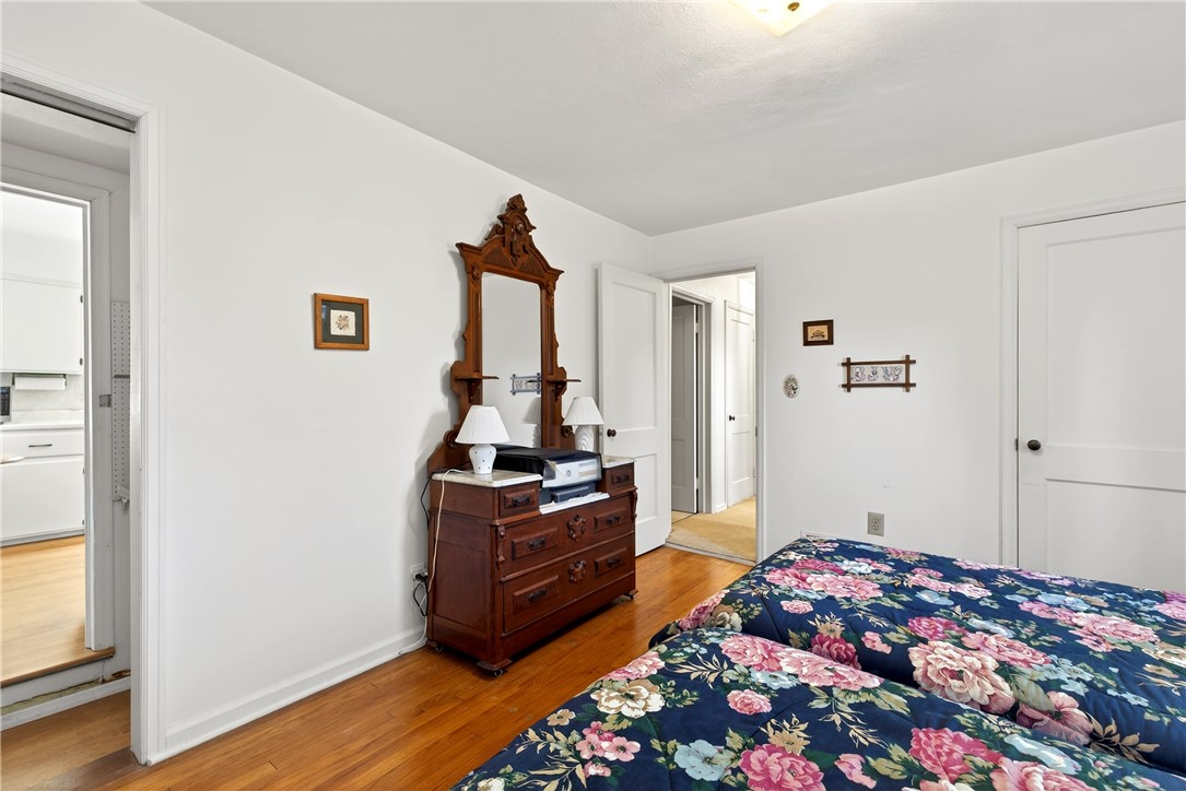 1237 Laurelwood Road Dayton, OH 45409 - Photo 24 of 56 This cozy bedroom features polished hardwood flooring and convenient access to adjacent rooms.
