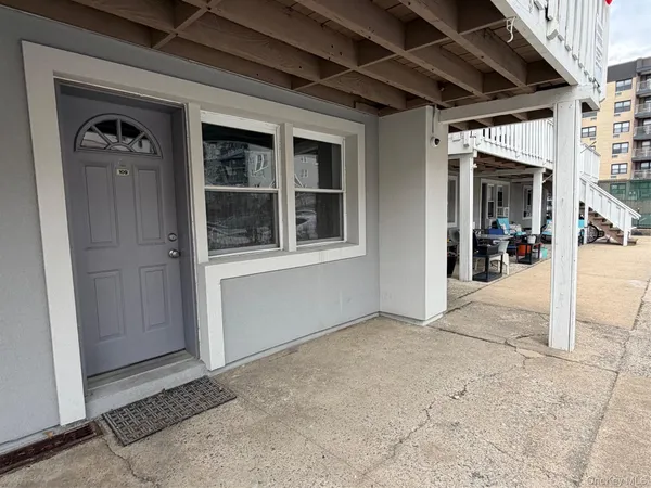 a view of a porch of a house