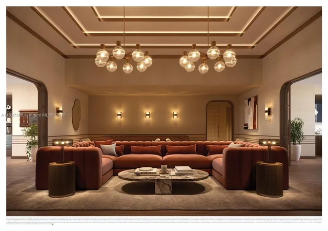 a living room with couch and a chandelier