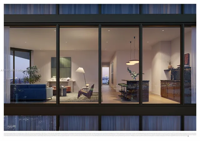 a room with wooden floor and potted plant