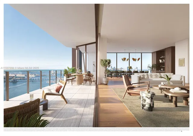 a living room with furniture and large windows