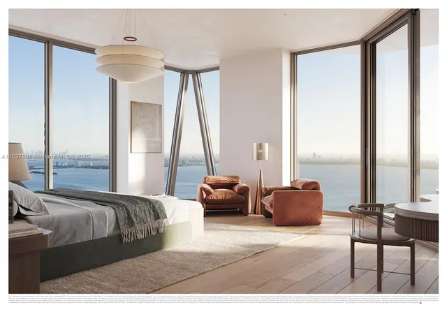 a living room with furniture a large window and a dining table