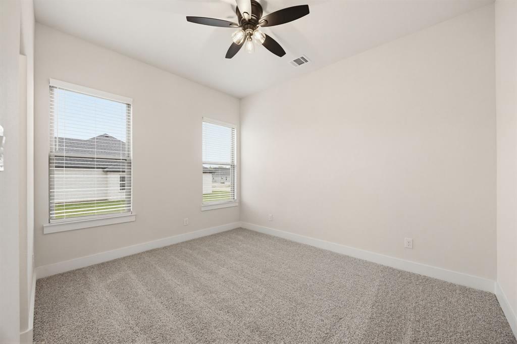 6713 Odom Road Sanger, TX 76266 - Photo 21 of 32 a view of an empty room with a window