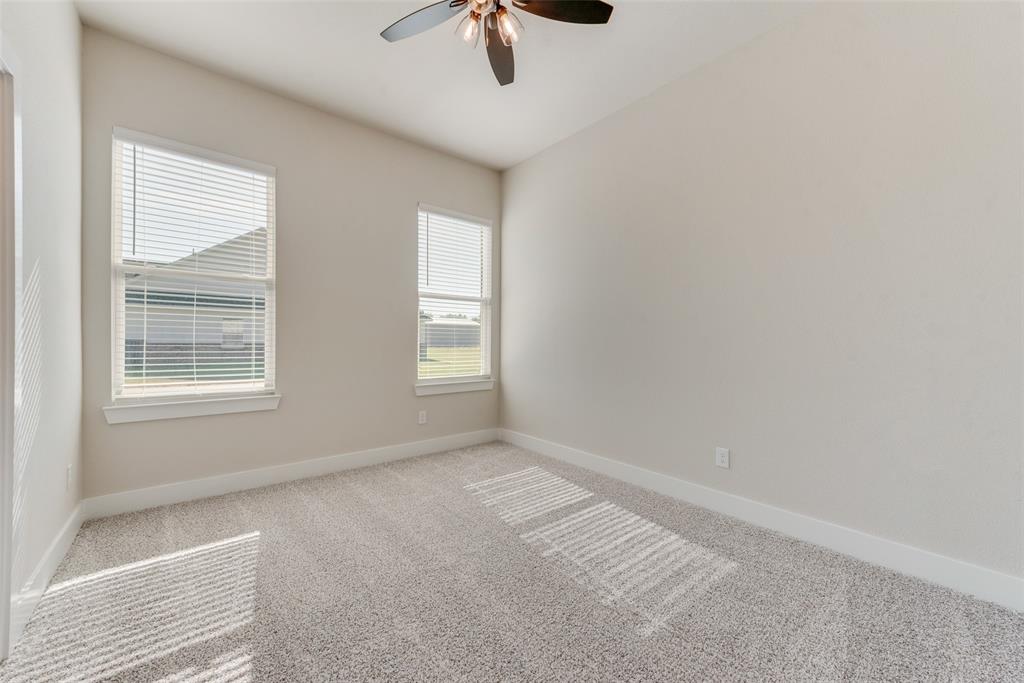 6713 Odom Road Sanger, TX 76266 - Photo 21 of 36 an empty room with windows