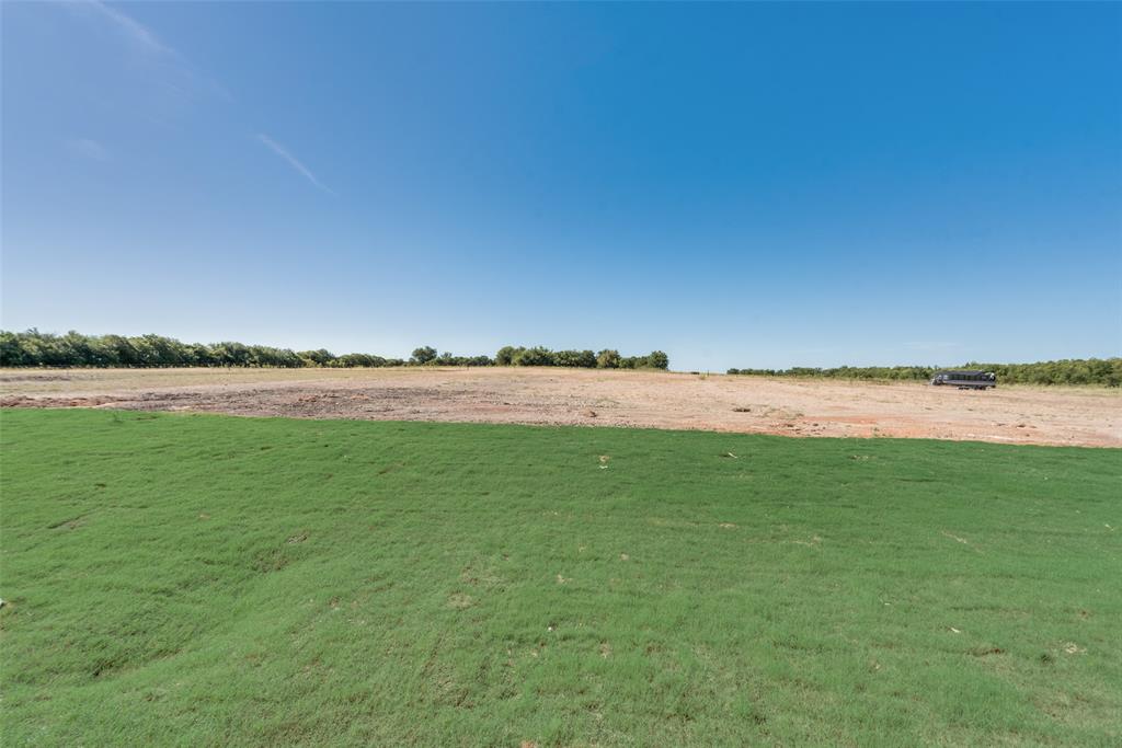 6713 Odom Road Sanger, TX 76266 - Photo 33 of 36 a view of a field with an ocean