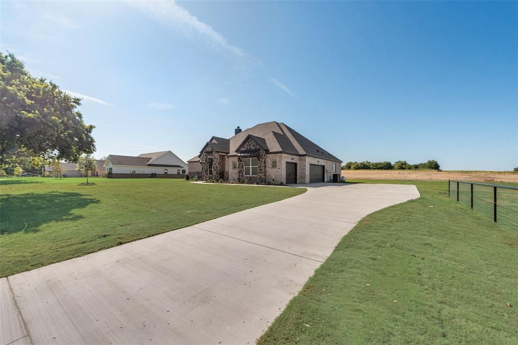 6713 Odom Road Sanger, TX 76266 - Photo 4 of 36 a view of swimming pool and a yard