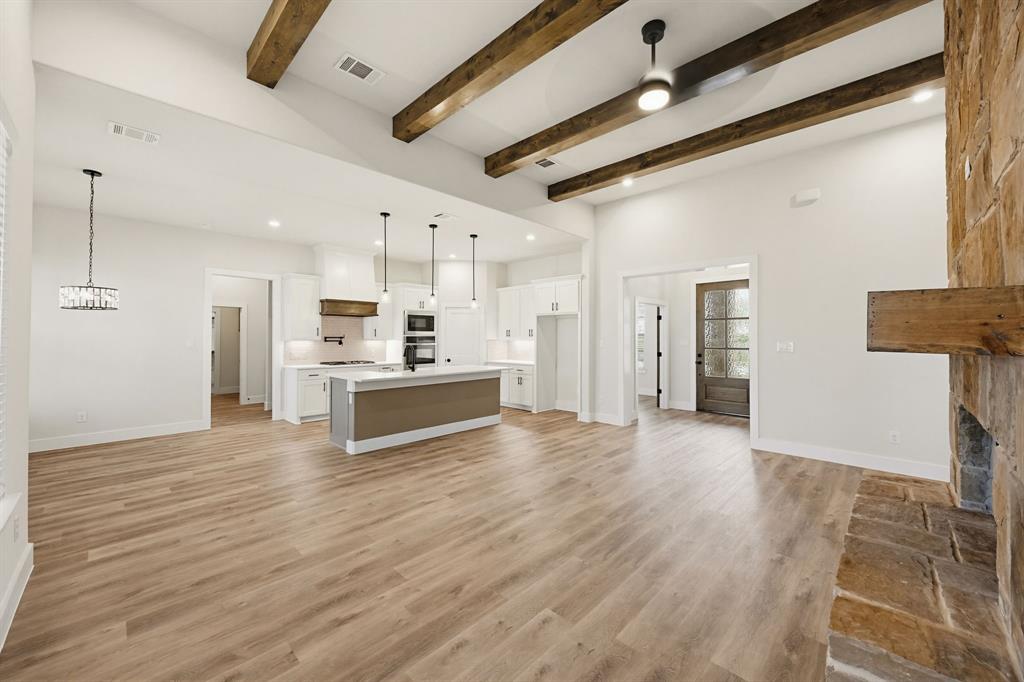6713 Odom Road Sanger, TX 76266 - Photo 5 of 32 a view of kitchen with wooden floor