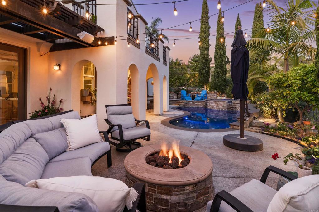 2367 Lapis Road Carlsbad, CA 92009 - Photo 38 of 58 a outdoor space with patio couches and a fireplace
