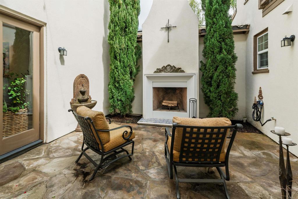 2367 Lapis Road Carlsbad, CA 92009 - Photo 10 of 58 a living room with furniture and a fireplace