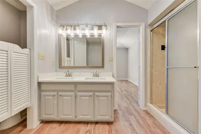 a bathroom with a bathtub and shower