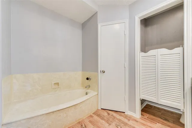 a view of a hallway with closet