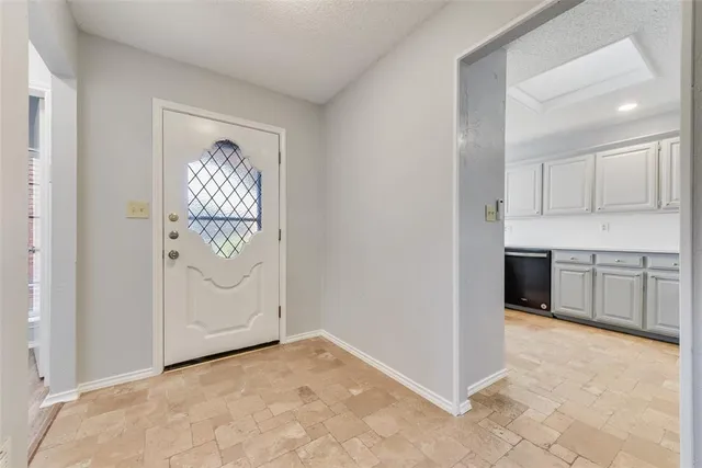 a view of a kitchen with electric appliances
