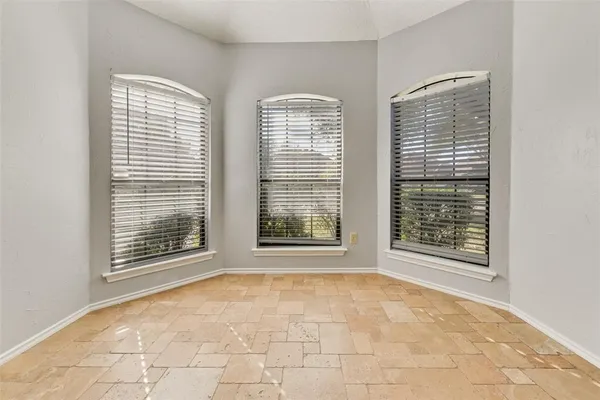 a kitchen with stainless steel appliances a refrigerator and a stove