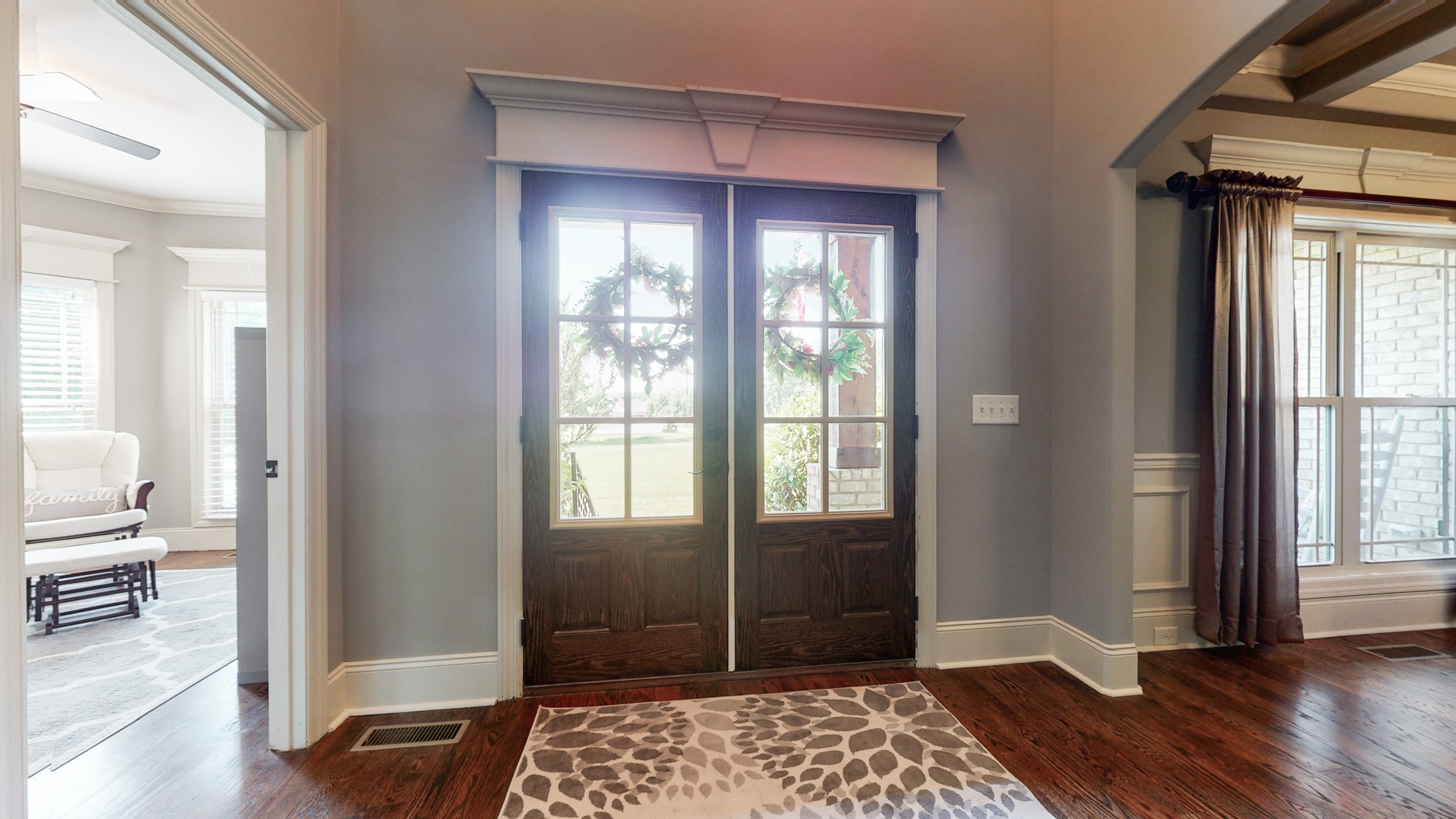 3800 Rowland Road Murfreesboro, TN 37128 - Photo 7 of 38 a view of a hallway with wooden floor and a bedroom
