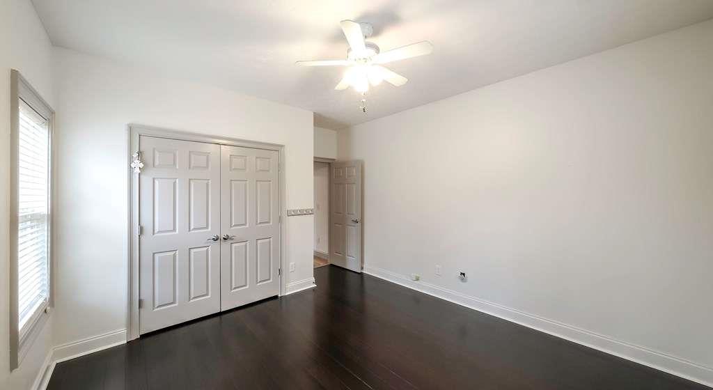111 Watson Drive Bremen, GA 30110 - Photo 26 of 60 wooden floor in an empty room with a window