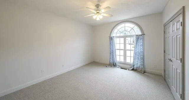 a bathroom with a sink toilet and mirror