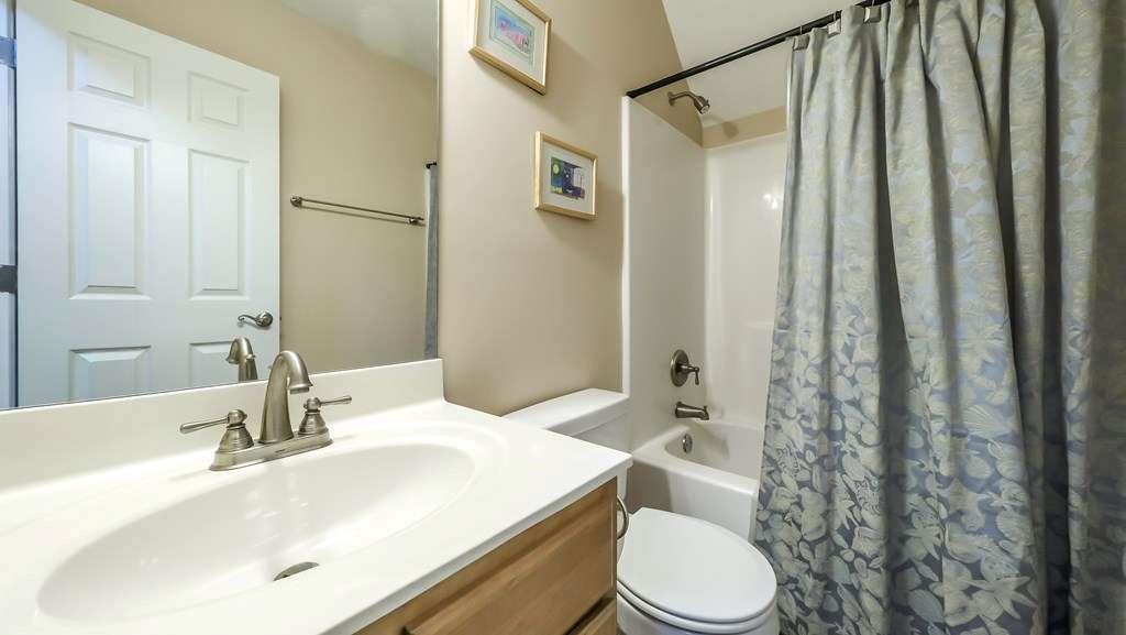 111 Watson Drive Bremen, GA 30110 - Photo 37 of 60 a bathroom with a sink toilet and shower