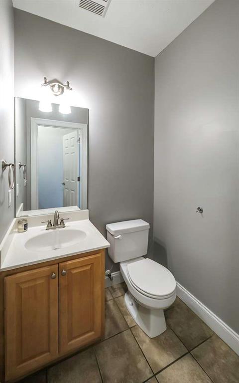 111 Watson Drive Bremen, GA 30110 - Photo 39 of 60 a bathroom with a sink toilet and mirror