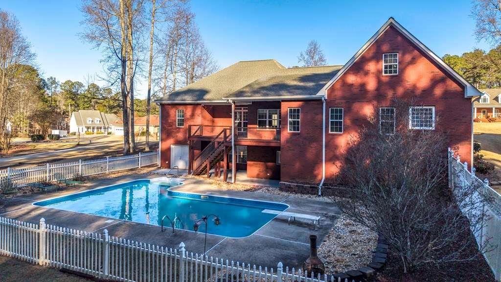 111 Watson Drive Bremen, GA 30110 - Photo 50 of 60 a front view of house with yard and trees in the background