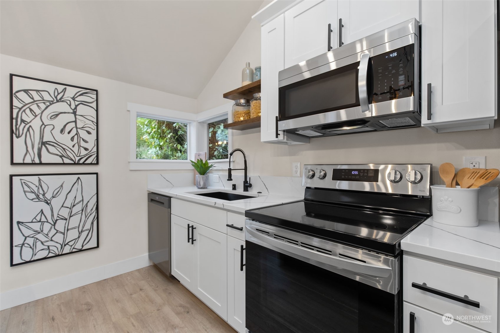 208 South 101st Street Seattle, WA 98168 - Photo 12 of 37 a view of kitchen with stainless steel appliances and cabinets