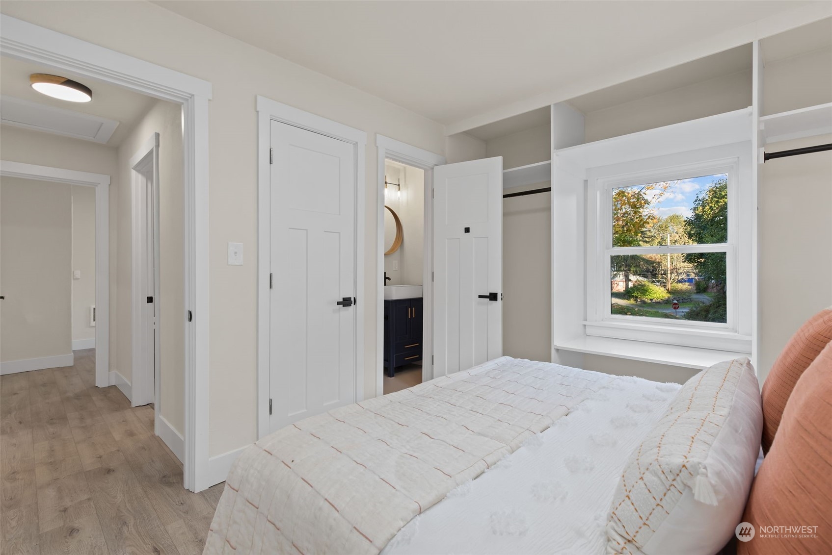 208 South 101st Street Seattle, WA 98168 - Photo 20 of 37 a bedroom with a bed and a window