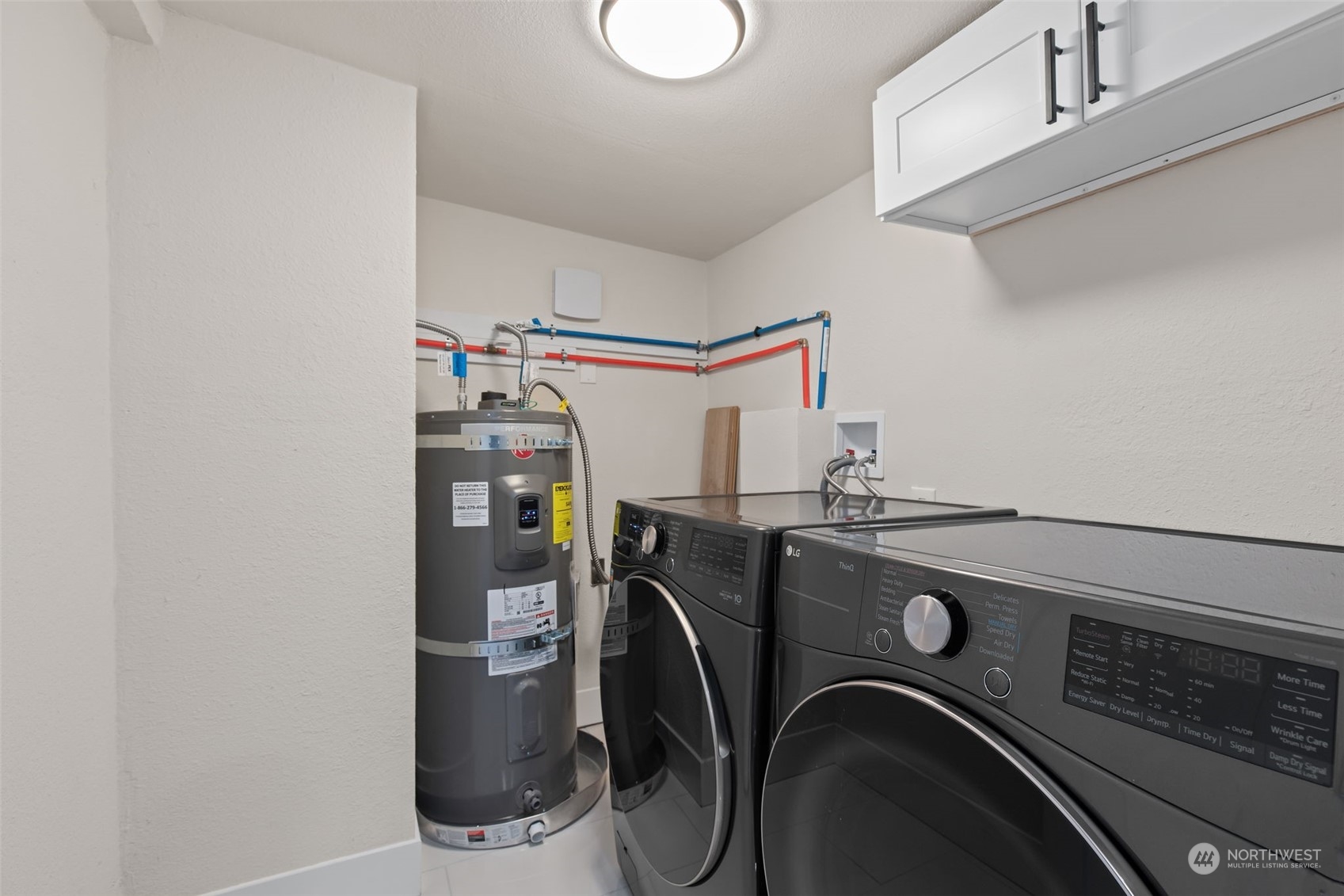 208 South 101st Street Seattle, WA 98168 - Photo 22 of 37 a utility room with dryer and washer