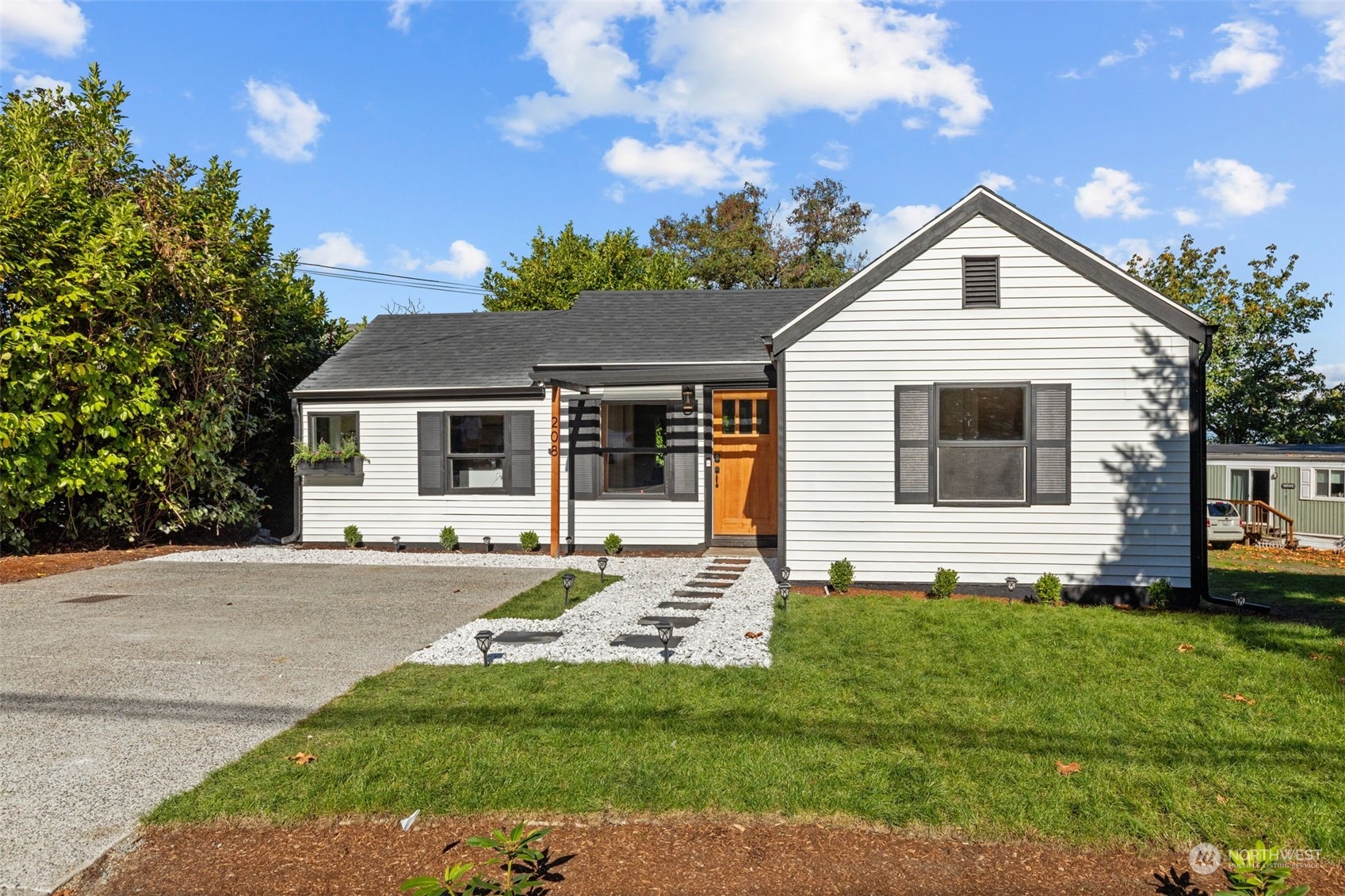 208 South 101st Street Seattle, WA 98168 - Photo 35 of 37 a view of a house with a yard
