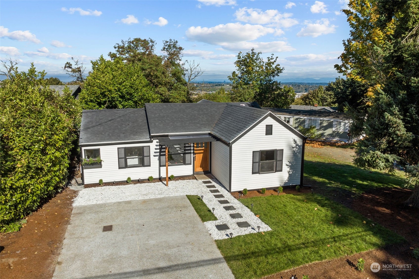 208 South 101st Street Seattle, WA 98168 - Photo 37 of 37 front view of a house with a yard