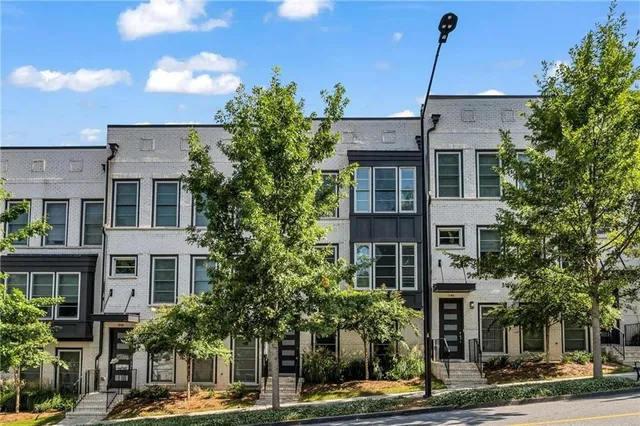 a front view of a building with street view