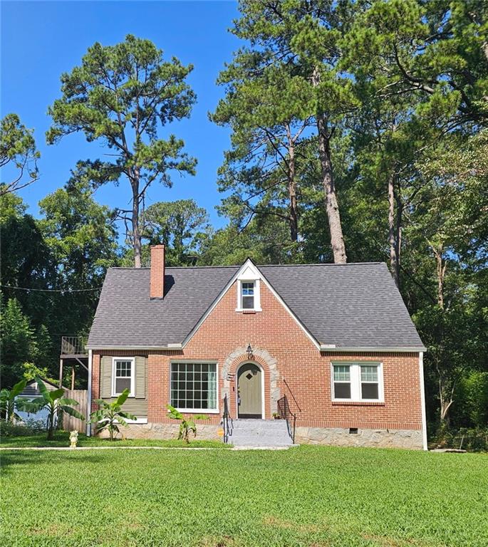 front view of a house with a yard