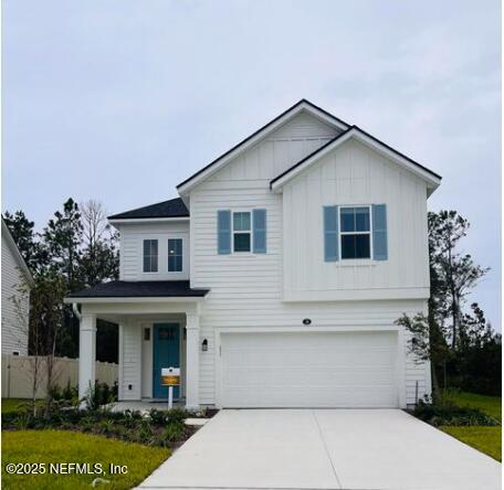 a view of house that has a yard