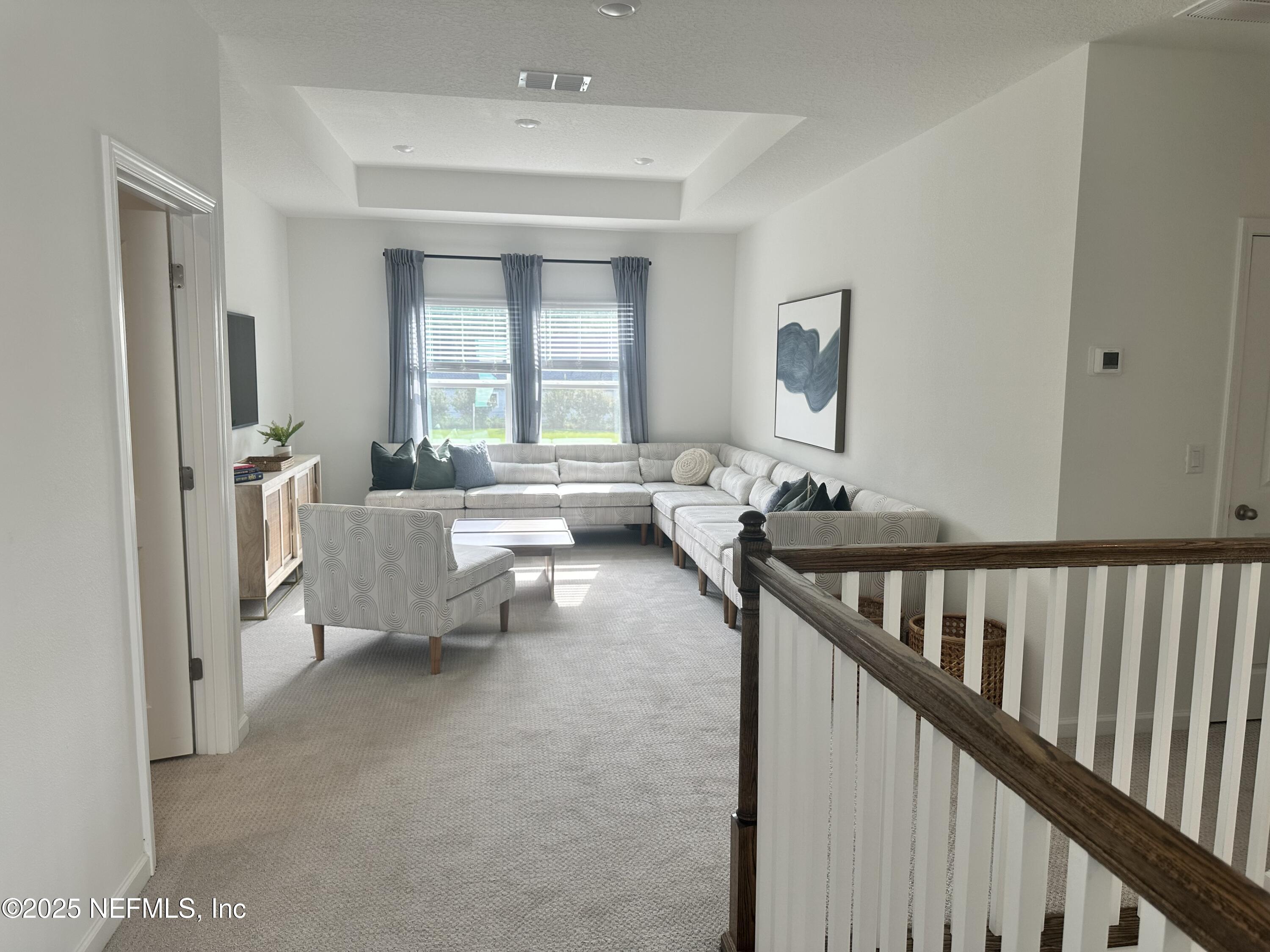 34 Twilight Lane St. Augustine, FL 32095 - Photo 12 of 20 a living room with furniture and a window