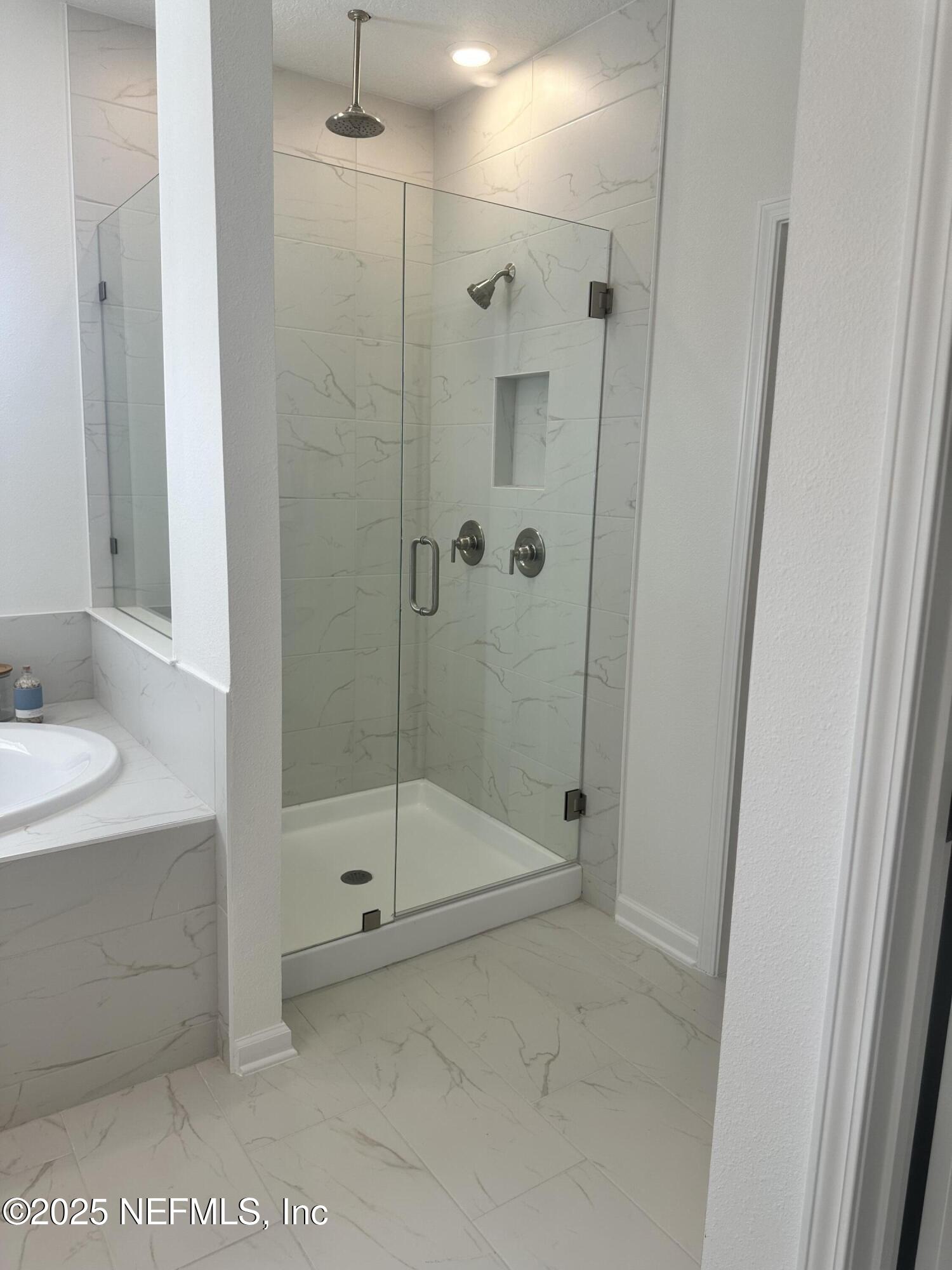 34 Twilight Lane St. Augustine, FL 32095 - Photo 16 of 20 a bathroom with a shower and a sink