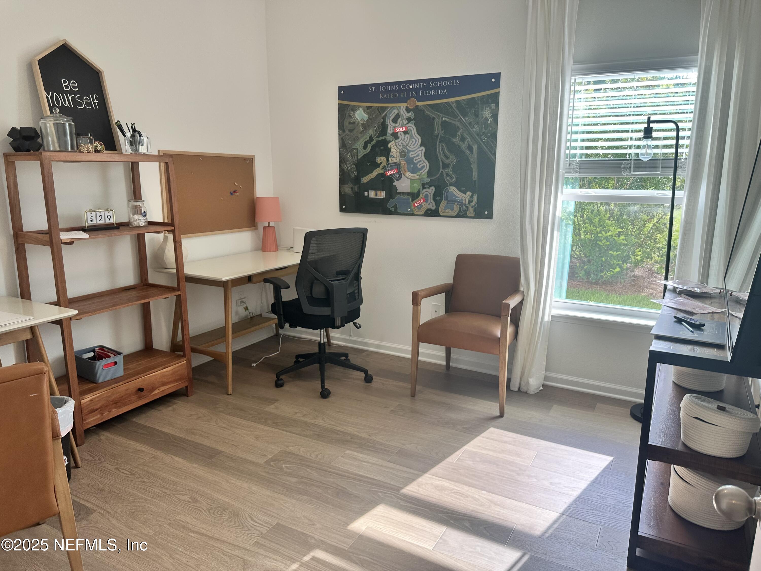 34 Twilight Lane St. Augustine, FL 32095 - Photo 10 of 20 a living room with furniture a rug and a window