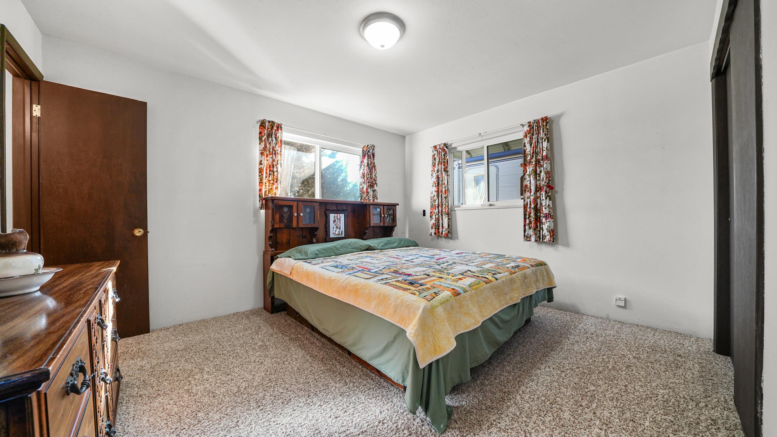 582 36 Road Palisade, CO 81526 - Photo 12 of 31 a bedroom with a bed and window