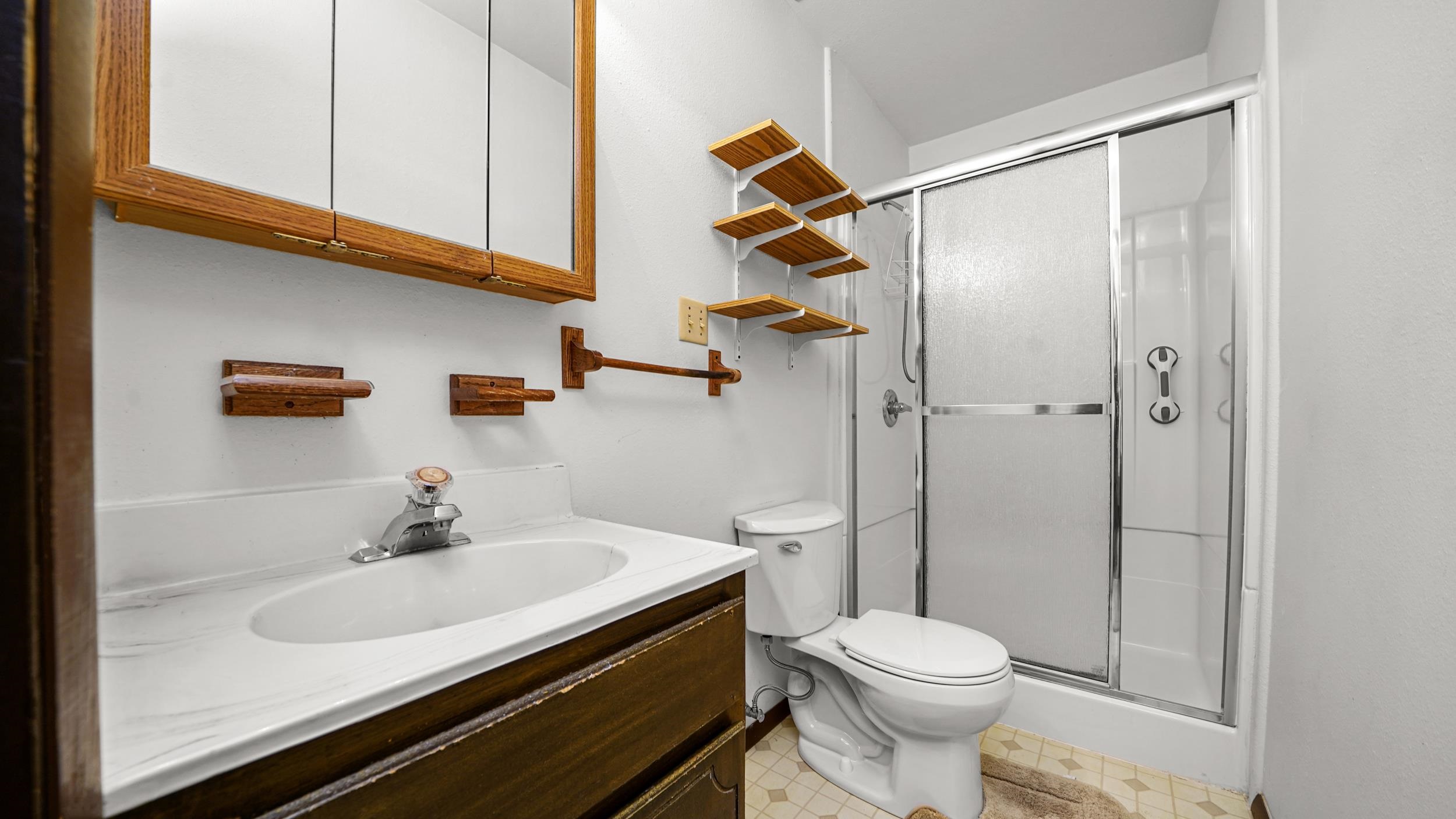 582 36 Road Palisade, CO 81526 - Photo 14 of 31 a bathroom with a sink a toilet and shower