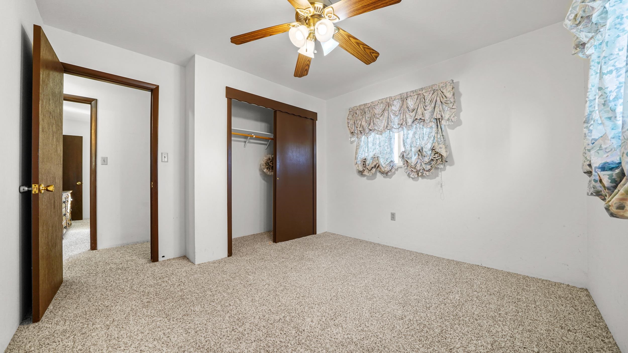582 36 Road Palisade, CO 81526 - Photo 15 of 31 an empty room with windows and fan