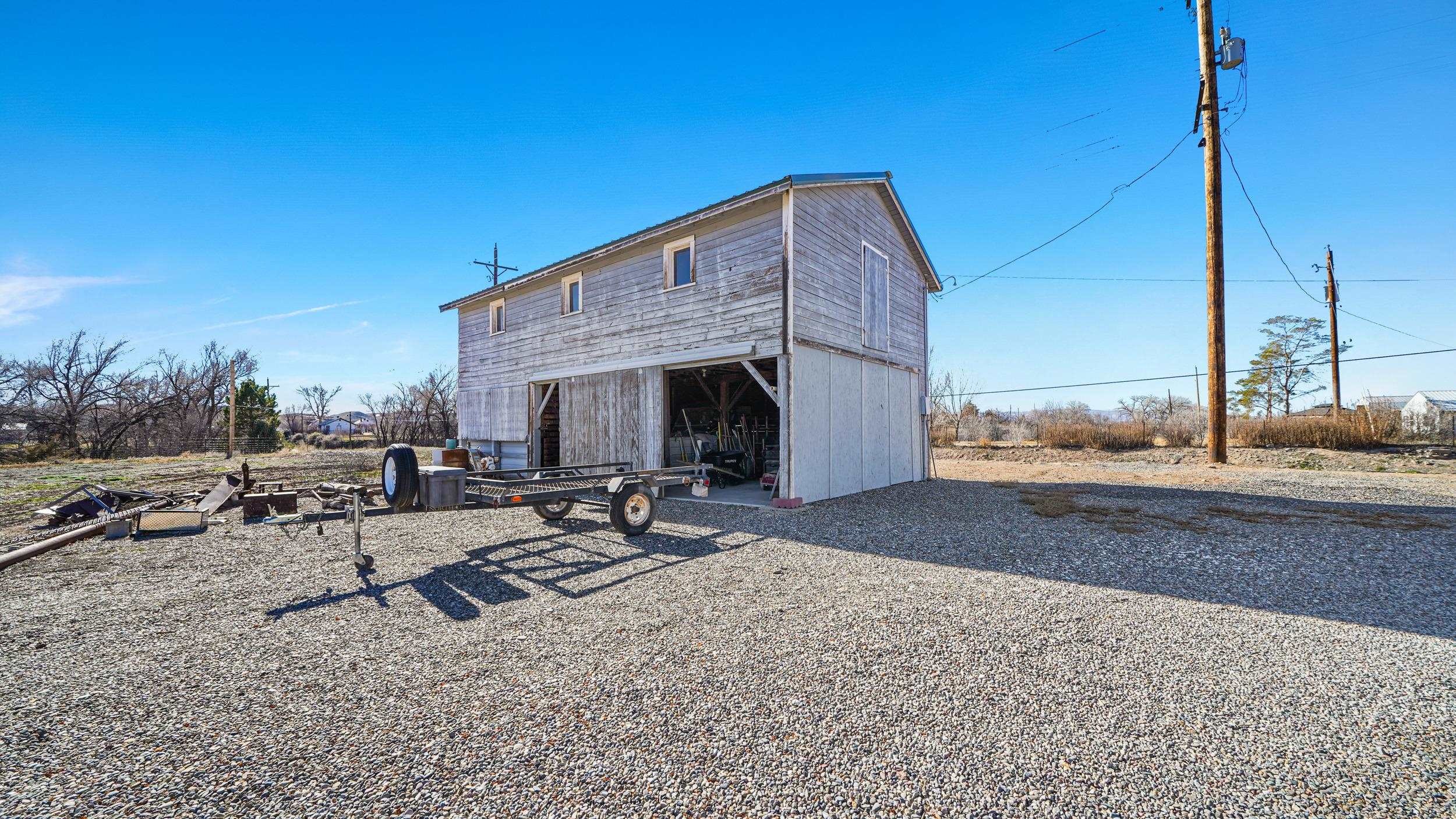 582 36 Road Palisade, CO 81526 - Photo 23 of 31 a view of a backyard with sitting area