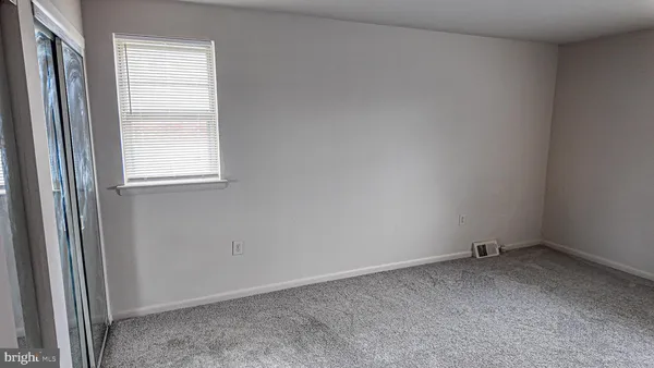 a view of a window in an empty room