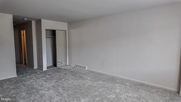 an empty room with closet