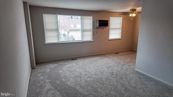 an empty room with windows