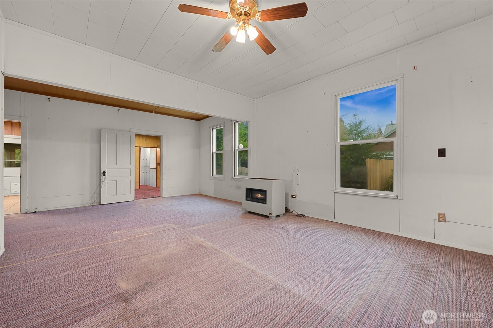 2701 Michigan Street Bellingham, WA 98226 - Photo 16 of 39 a view of an empty room with window and wooden floor