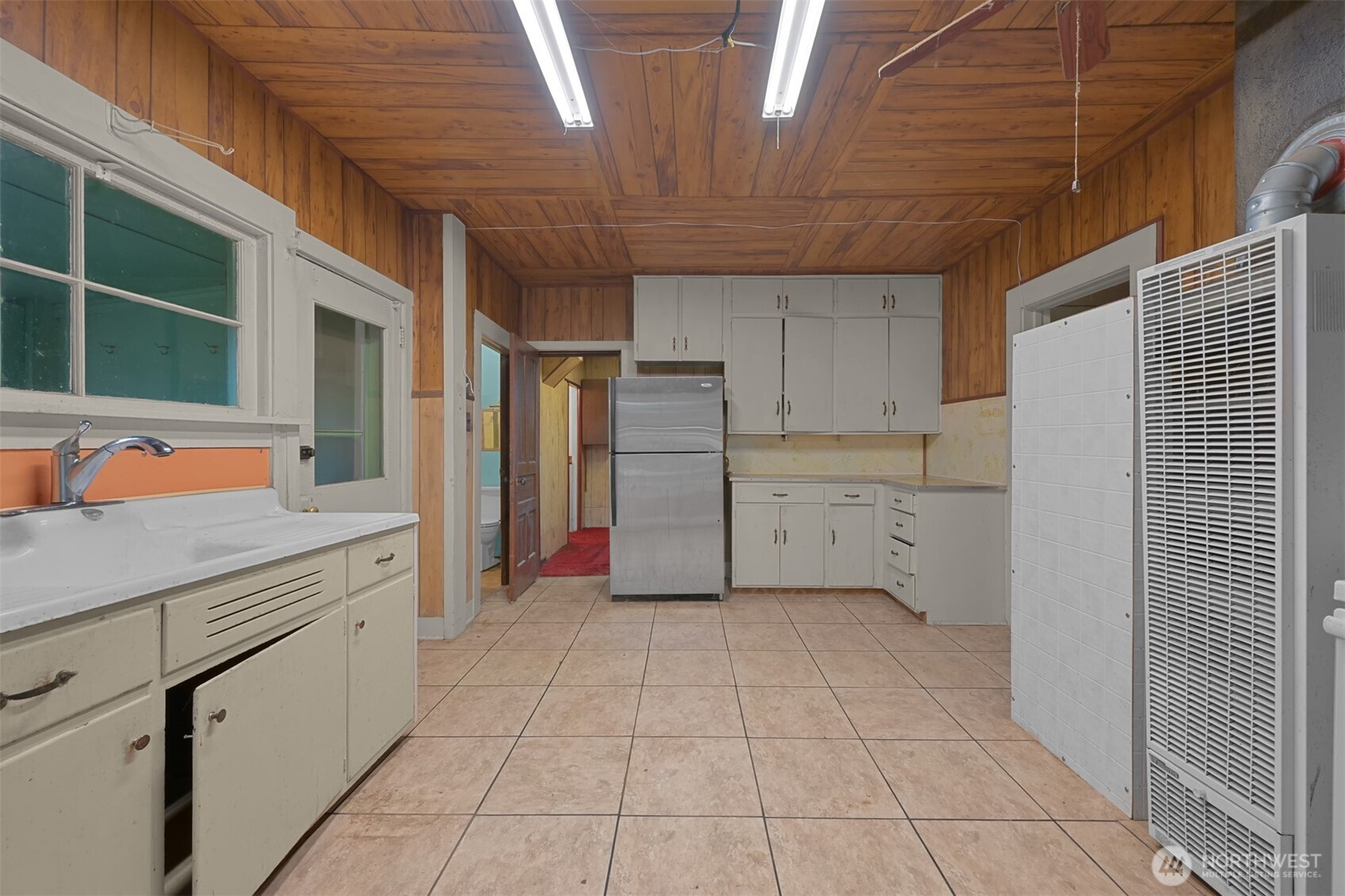 2701 Michigan Street Bellingham, WA 98226 - Photo 25 of 39 a room with white cabinets and appliances