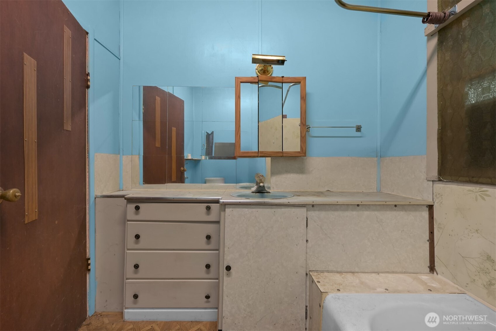 2701 Michigan Street Bellingham, WA 98226 - Photo 28 of 39 a bathroom with a sink and a mirror