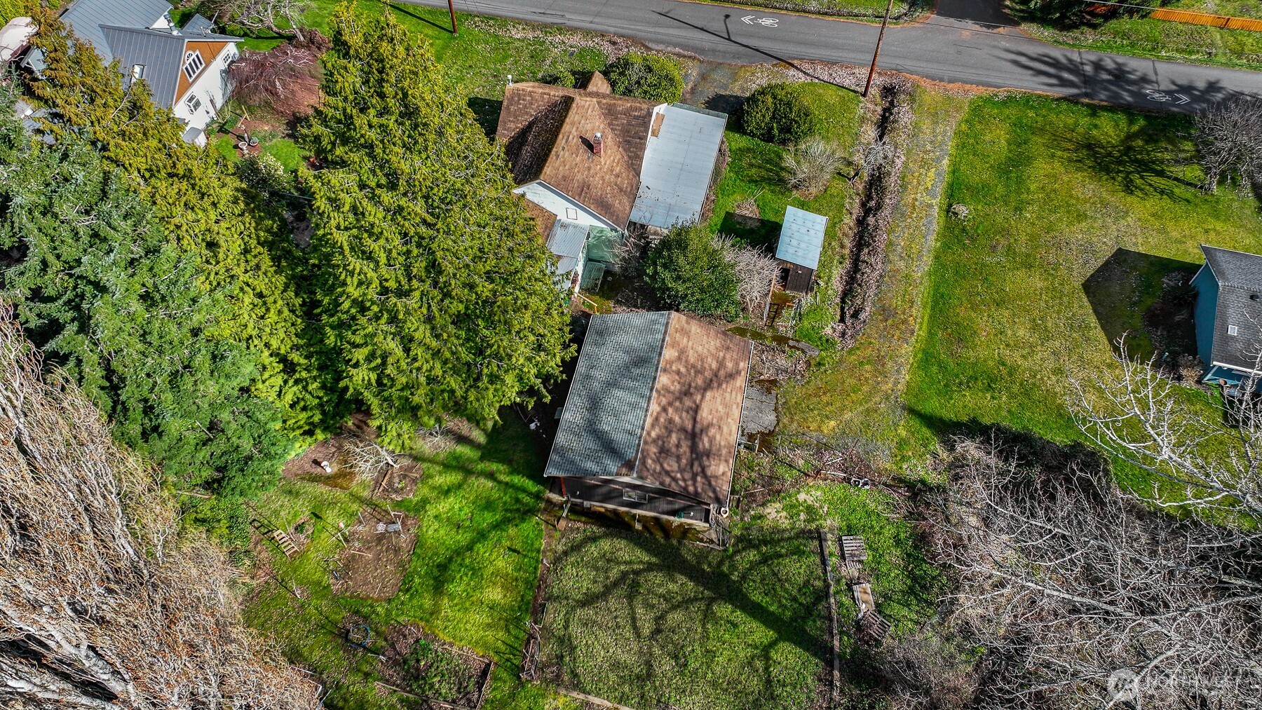 2701 Michigan Street Bellingham, WA 98226 - Photo 6 of 39 an aerial view of a house with a yard basket ball court and outdoor seating