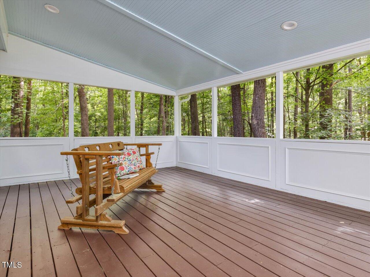 10609 Chinkapin Place Raleigh, NC 27613 - Photo 29 of 78 a view of a room with wooden floor and outdoor space